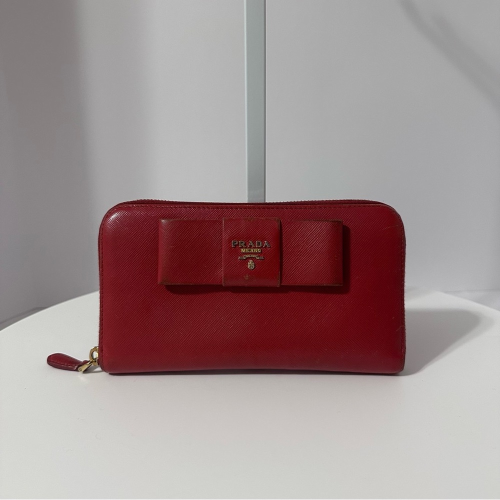Fair Condition Prada wallet orangey/redish needs some work